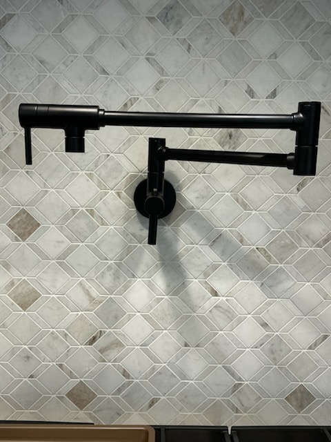 Fixtures by Livas Contracting Services, Katy TX: Matte black pot filler on marble