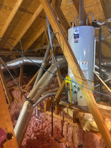 Attic water heater by Livas Contracting Services, Katy TX: Tank set and connected in the attic
